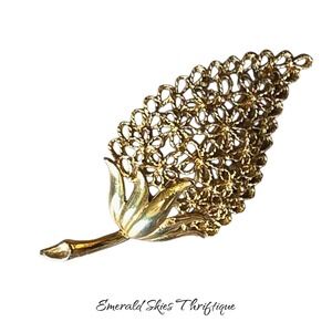 Vintage signed Mamselle gold tone filigree leaf/flower. Free shipping